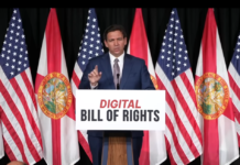 Florida Governor Ron DeSantis speaking at a podium