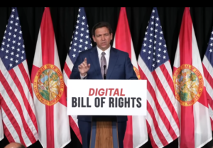 Florida Governor Ron DeSantis speaking at a podium