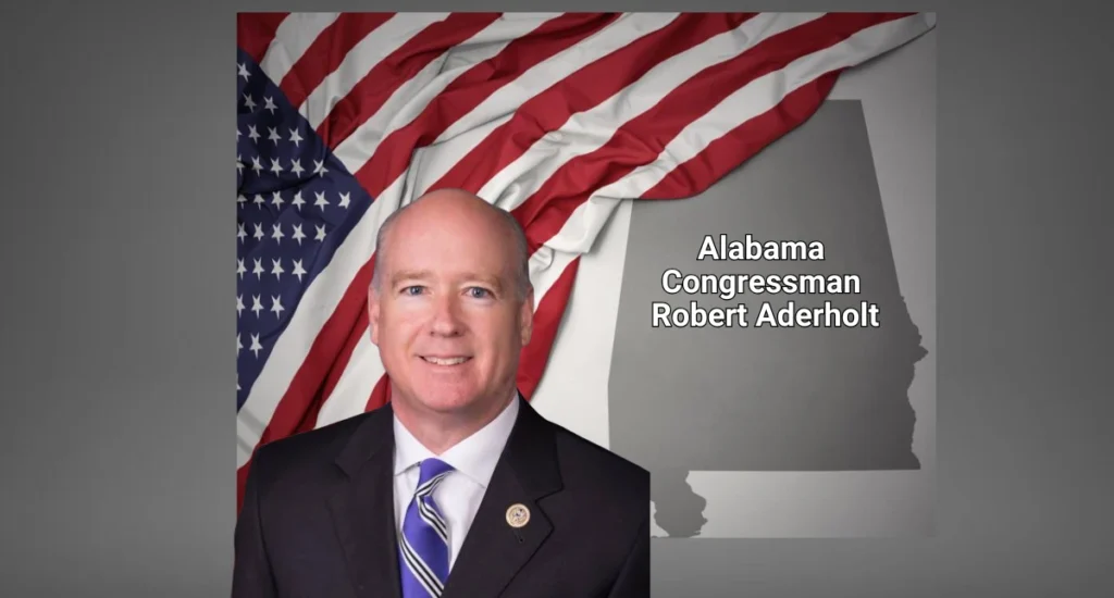 Picture of Alabam Congressman Robert Alderholt, with a map of alabama in the background